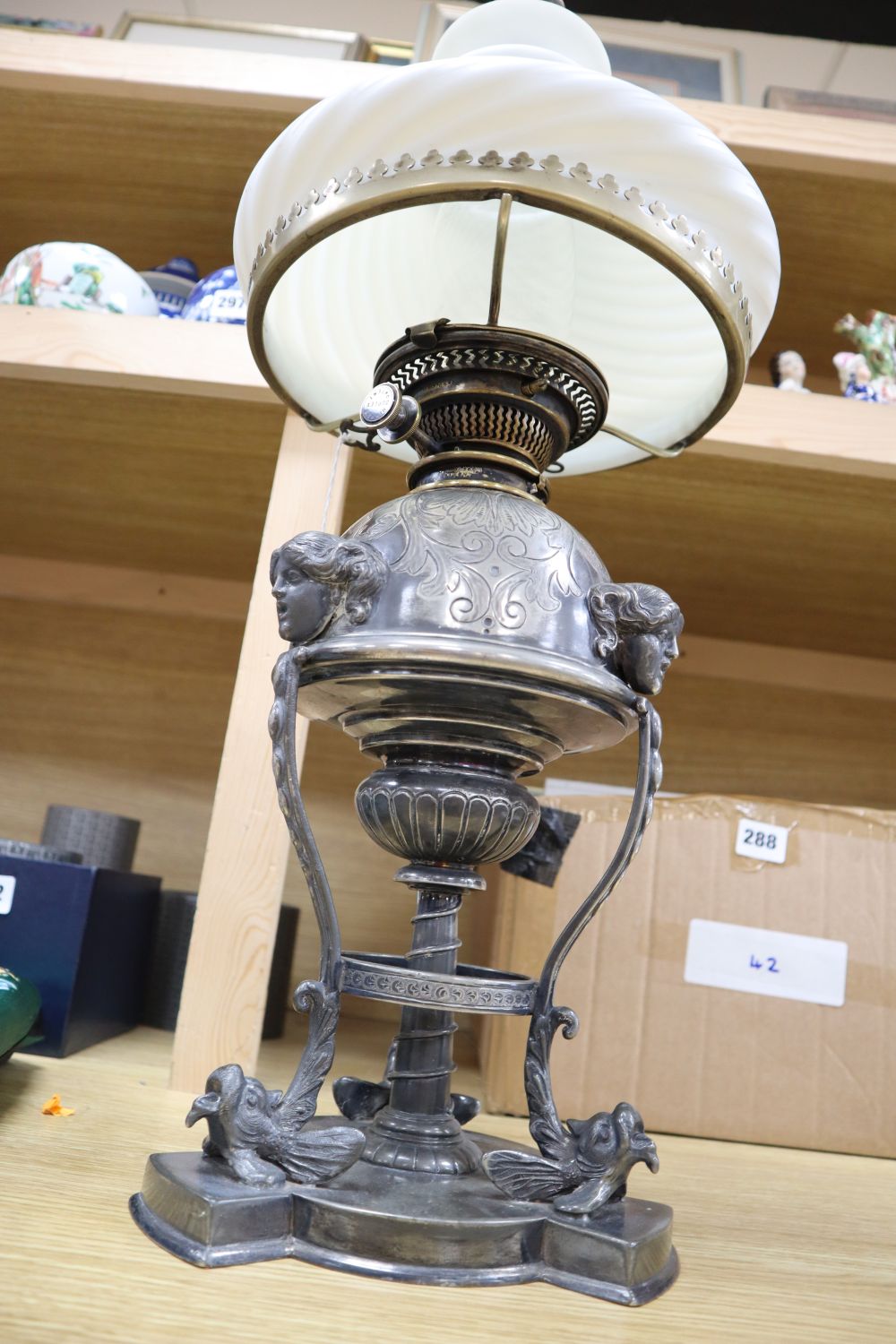 A Victorian Hinks silver plated oil lamp, shade and chimney